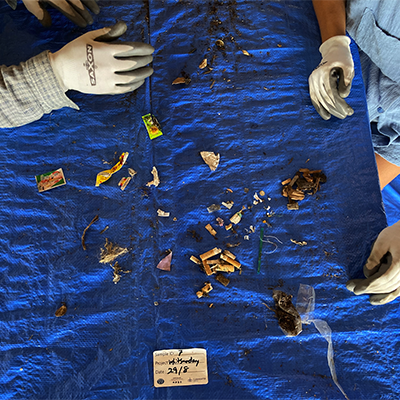 Volunteers sorting litter as part of the Whitsunday Gross Pollutant Trap Project.